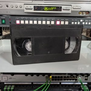 Plain black unmarked VHS cassette containing a 2006 TiVo transfer of David Blaine and Dr. Phil (VHS-2026-458)
