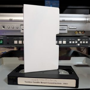 Handwritten label: Used @ home store opening. Yankee Candle retail construction corporate video from 1983 (VHS-2025-041)