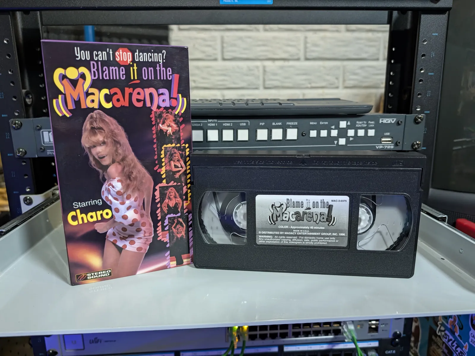 VHS-2026-1163: Blame it on the Macarena!, physical VHS tape in the 90s Craig archive.