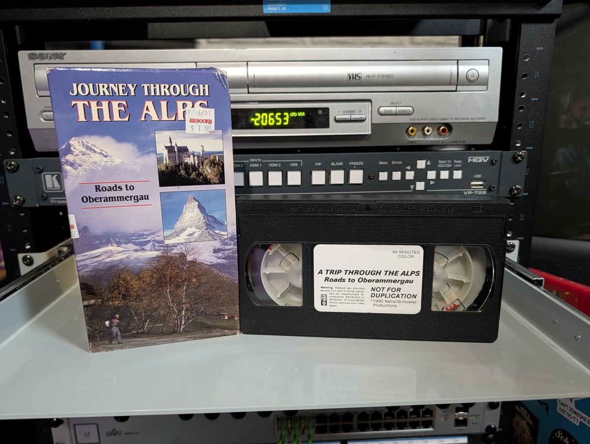 Ex-rental VHS with Blockbuster sticker, 1990 Alps travel doc, Oberammergau Passion Play with classical music (VHS-2026-206)