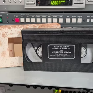 VHS-2026-758: Body Slide Instructional Plus Workout Video (1993), physical VHS tape in the 90s Craig archive.