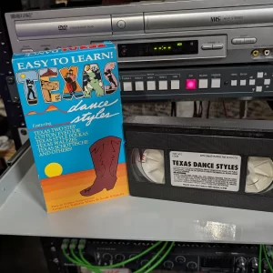 VHS-2026-811: Texas Dance Styles with Valerie Moss and Scott Schmitz, physical VHS tape in the 90s Craig archive.