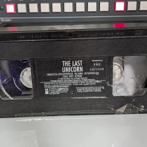 VHS-2026-821: The Last Unicorn (FHE / Artisan VHS), physical VHS tape in the 90s Craig archive.