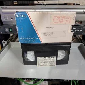 VHS-2026-832: NordicFitnessChair: NordicTrack Promotional Video (1990), physical VHS tape in the 90s Craig archive.