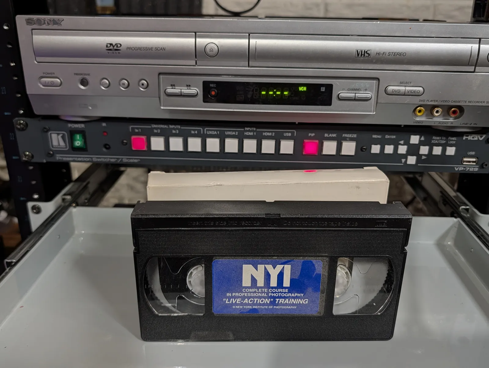 VHS-2026-843: NYI Complete Course in Professional Photography: Live-Action Training, physical VHS tape in the 90s Craig archive.