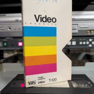 Polaroid sleeve and handwritten VHS label mentioning Jetsons Movie and Invader Zim.