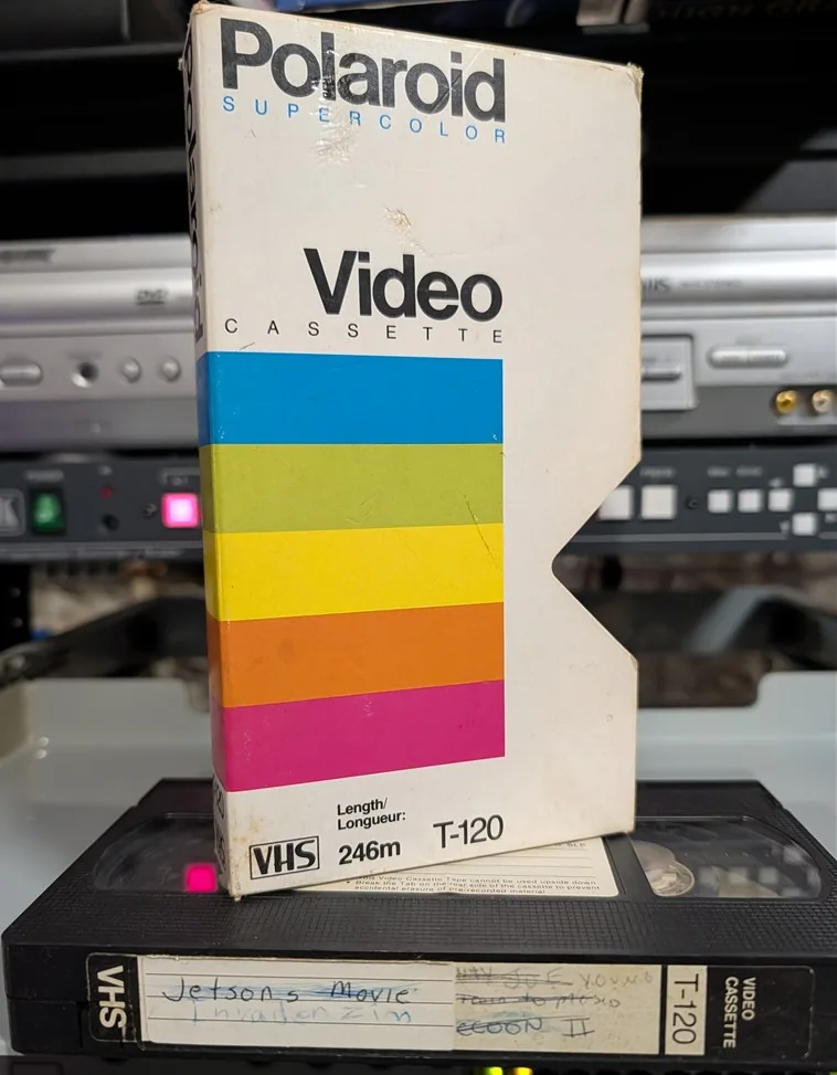 Polaroid sleeve and handwritten VHS label mentioning Jetsons Movie and Invader Zim.