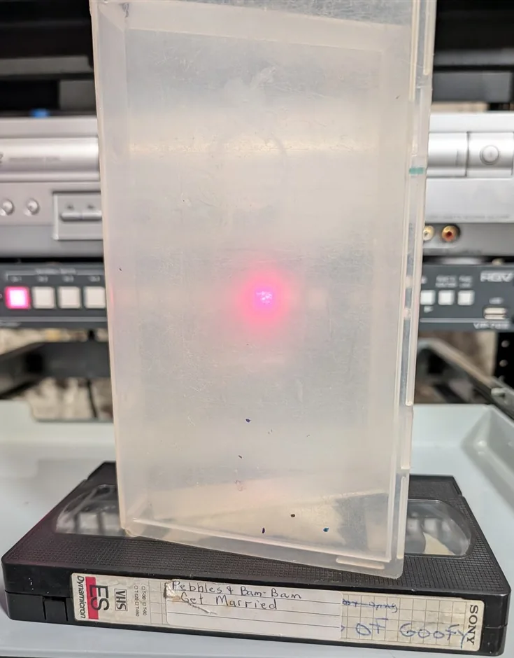 Sony VHS with handwritten Pebbles & Bam Bam Get Married spine label beneath clear case.