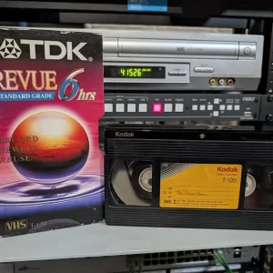 Kodak tape beside a mismatched TDK Revue sleeve