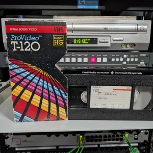 Sony tape labeled I Desire and Wolfen beside a mismatched Royal Sound sleeve